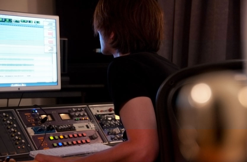 AudioLot President and Chief Engineer Joshua Aaron mixing an album at the studio desk