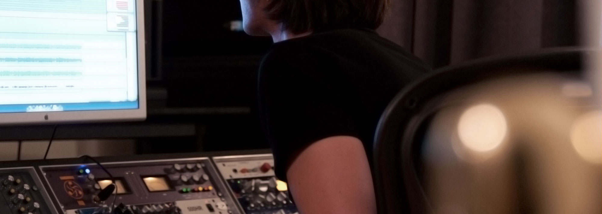 AudioLot President and Chief Engineer Joshua Aaron mixing an album at the studio desk