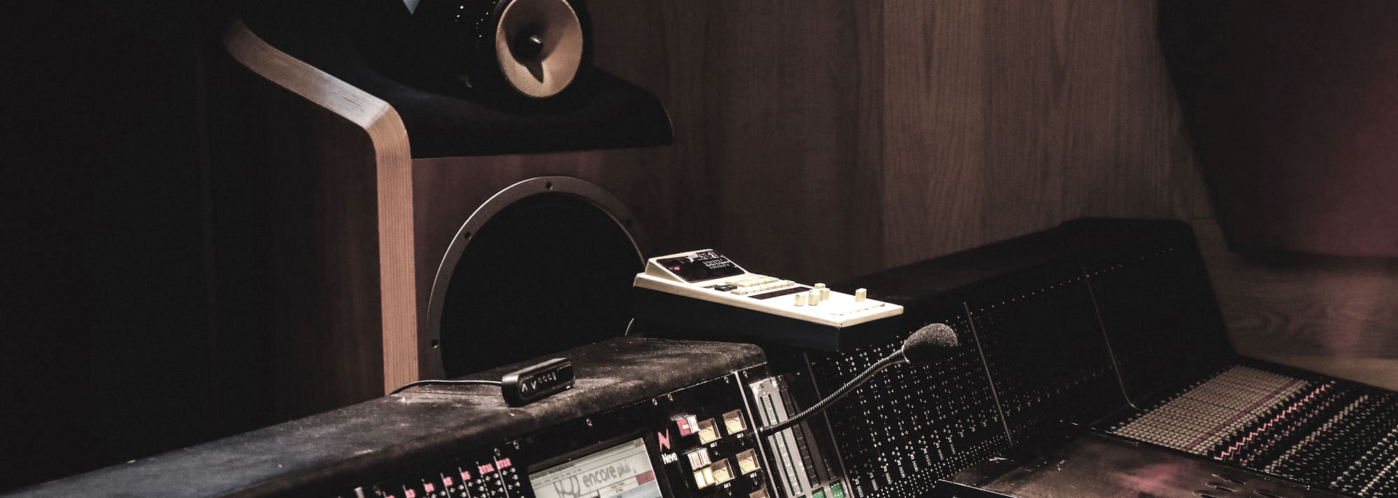 Recording studio control room with monitors, Lexicon LARC, and a large format recording console